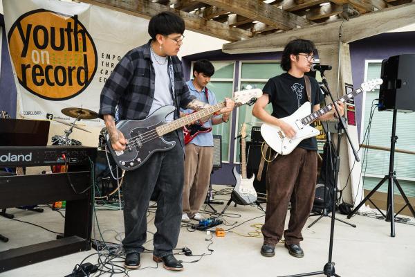 photo of a band playing at Youth on Record's Block Party